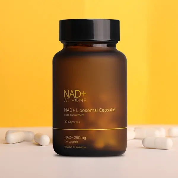 Premium liposomal NAD+ supplement bottle displayed on a yellow background for daily cellular health support.