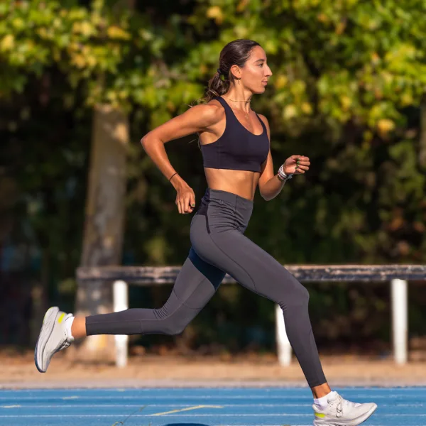 Can NAD+ Help With Weight Loss? A woman running.