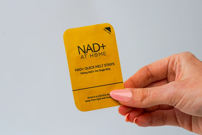 NAD+ Quick Melt Strip supplement held in hand
