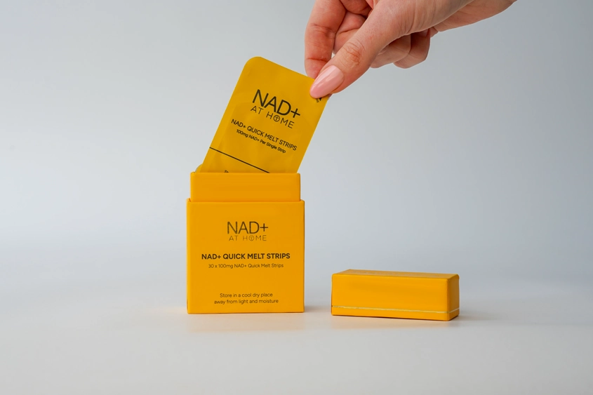 NAD+ Quick Melt Strip being removed from NAD+ supplement packaging